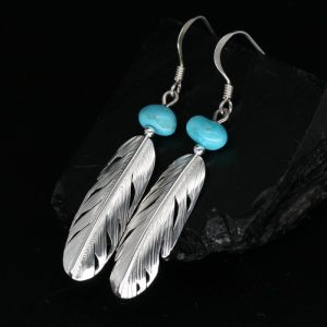 Feather earrings with turquoise by Harvey Chavez