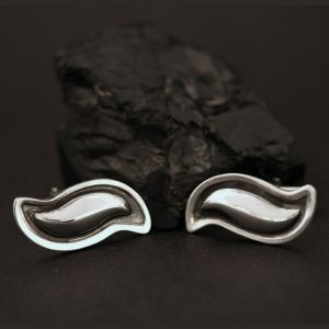 Silver cufflinks by Jennifer Medina