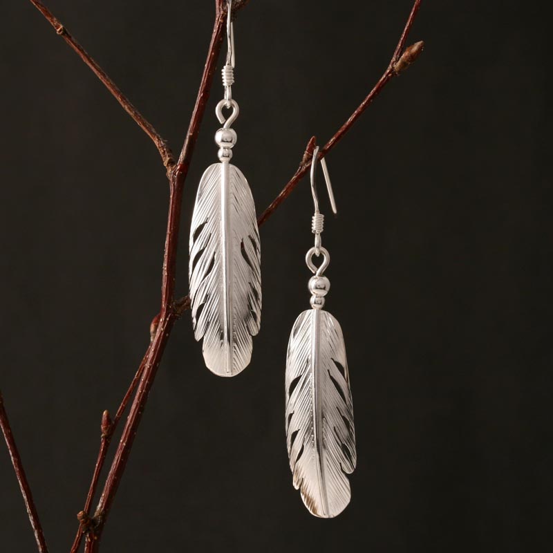 silver feather earrings by Harvey Chavez - Rainmaker Gallery