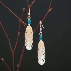 sterling silver feather earrings by Harvey Chavez