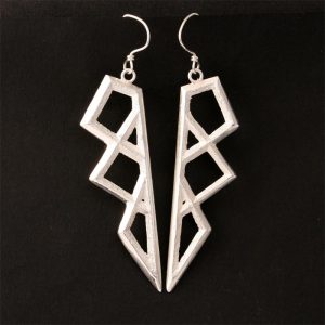 Silver tufa cast earrings by Tim Herrera