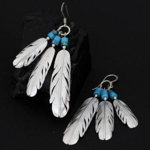 Feather fan earrings by Harvey & Janie Chavez