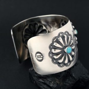 Turquoise & silver repoussé cuff bracelet by Jennifer Medina
