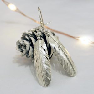 Silver Feather Earrings by Harvey Chavez