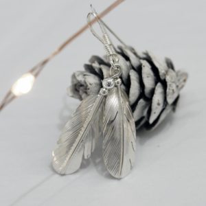 Silver Feather Earrings by Harvey Chavez