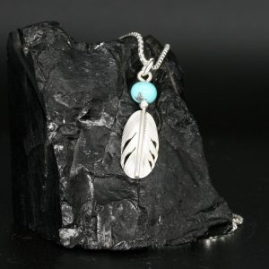 turquoise & silver feather pendant by Harvey Chavez