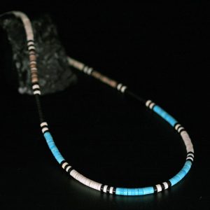 Heishi necklace with turquoise by Harvey & Janie Chavez.